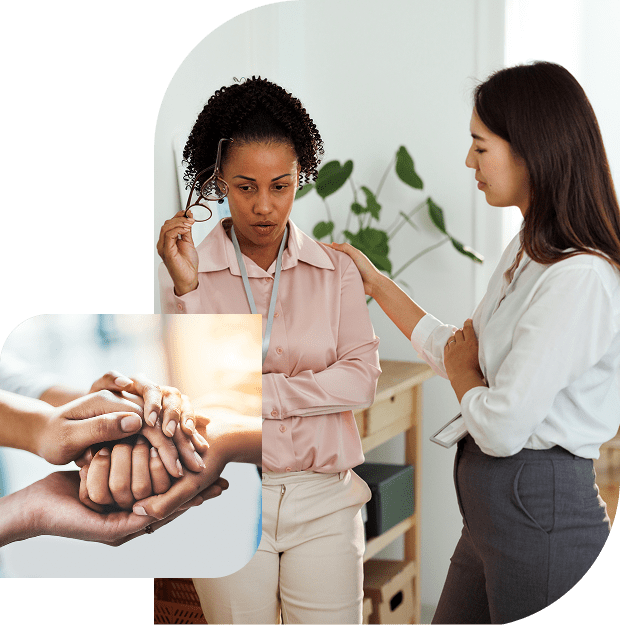Two women conversing; hands offering support.